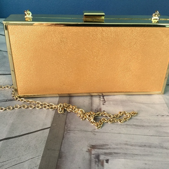 JustFab Gold Clutch with Elegant Flap Closure - Picture 2 of 8